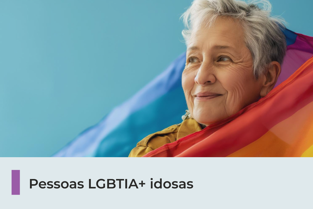 A imagem mostra uma mulher com cabelos grisalhos envolta em um tecido colorido. 